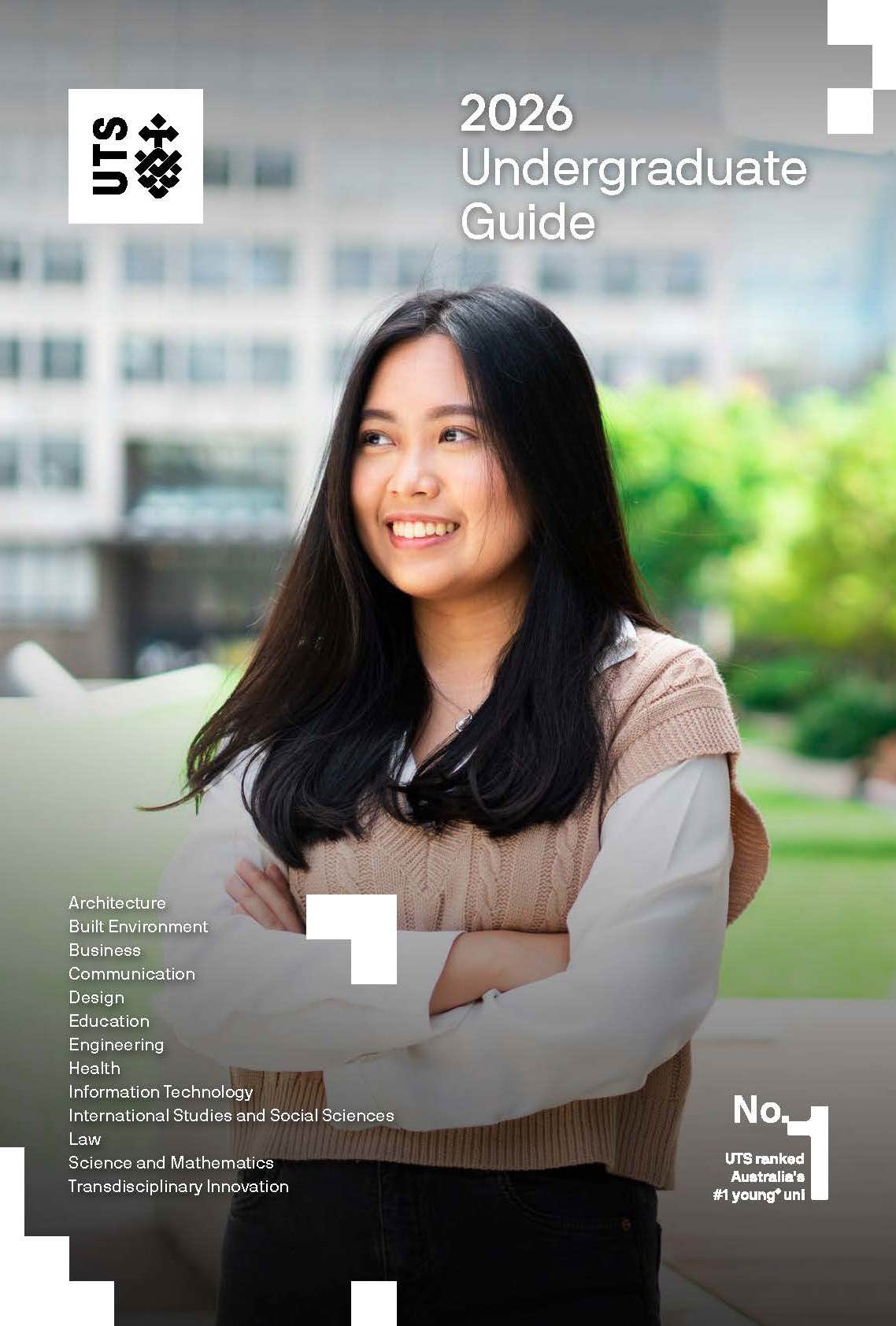 Female student in red top smiling in front of UTS Central.